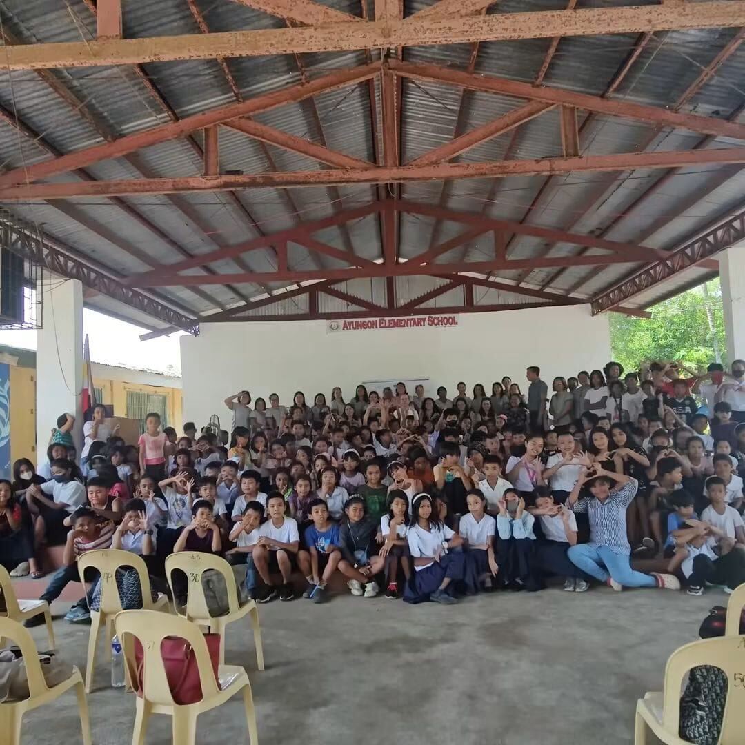 Pupils and staff gathered at school